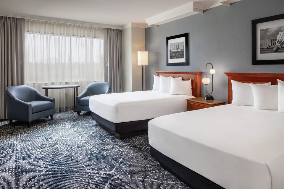 Pillowtop beds, blackout drapes, iron/ironing board, WiFi