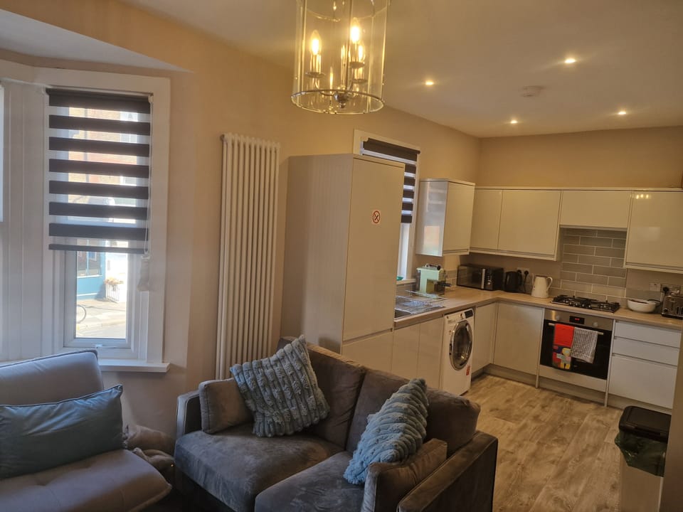Luxury Apartment, City View | Living area | TV