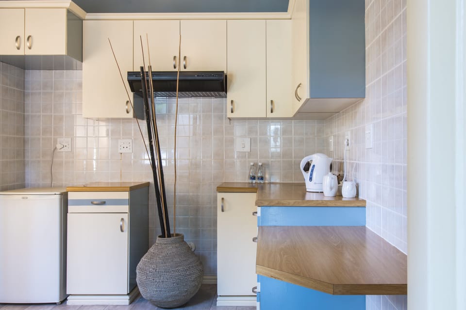 Family Cottage, 2 Bedrooms, Garden View, Courtyard Area (The Nest) | Private kitchen | Espresso maker, coffee/tea maker, electric kettle
