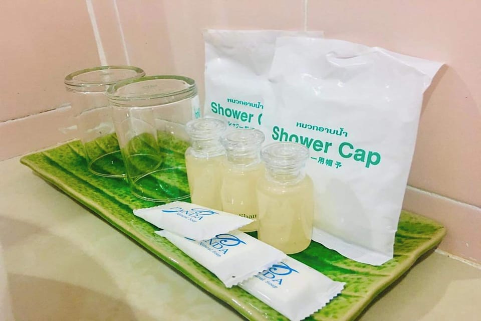 Shower, free toiletries, hair dryer, slippers