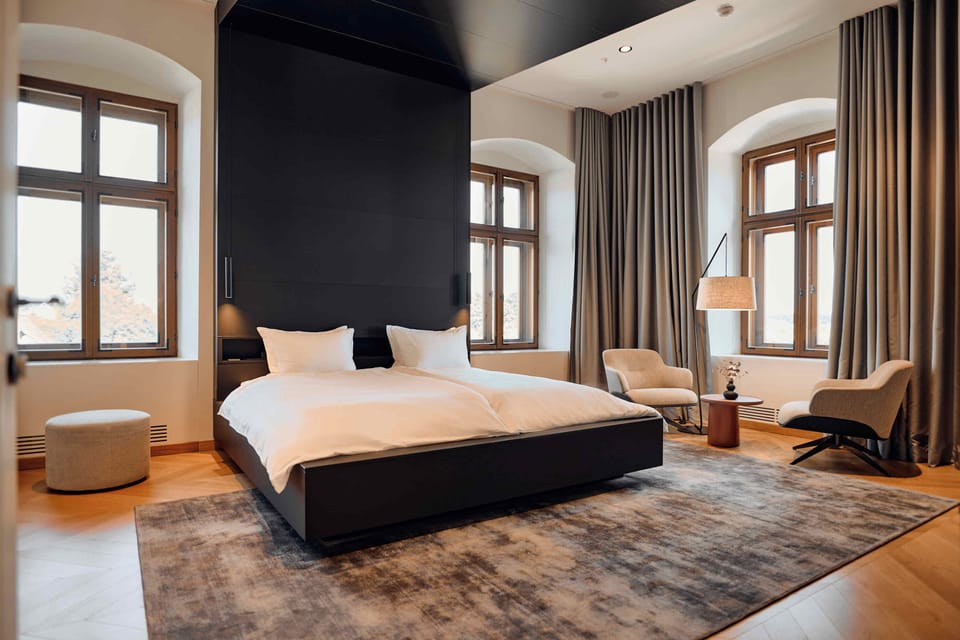 Deluxe Suite, Park View | Minibar, in-room safe, desk, laptop workspace