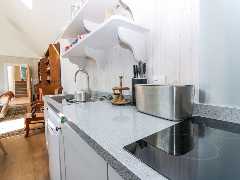 Fridge, dishwasher, toaster, cookware/dishes/utensils