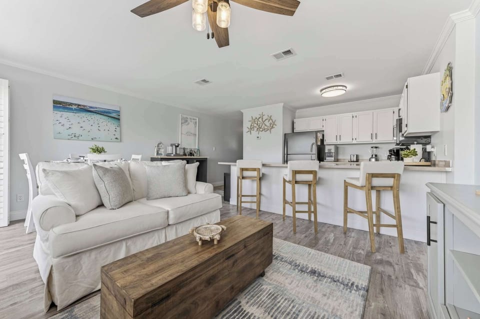 Condo, 1 Queen Bed with Sofa bed, Balcony, Garden View (Emerald Isle Escape) | Living area | 42-inch flat-screen TV with digital channels