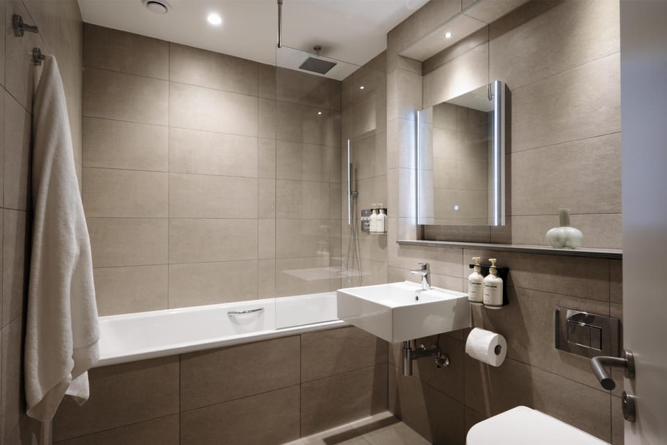 Eco-friendly toiletries, hair dryer, towels, soap