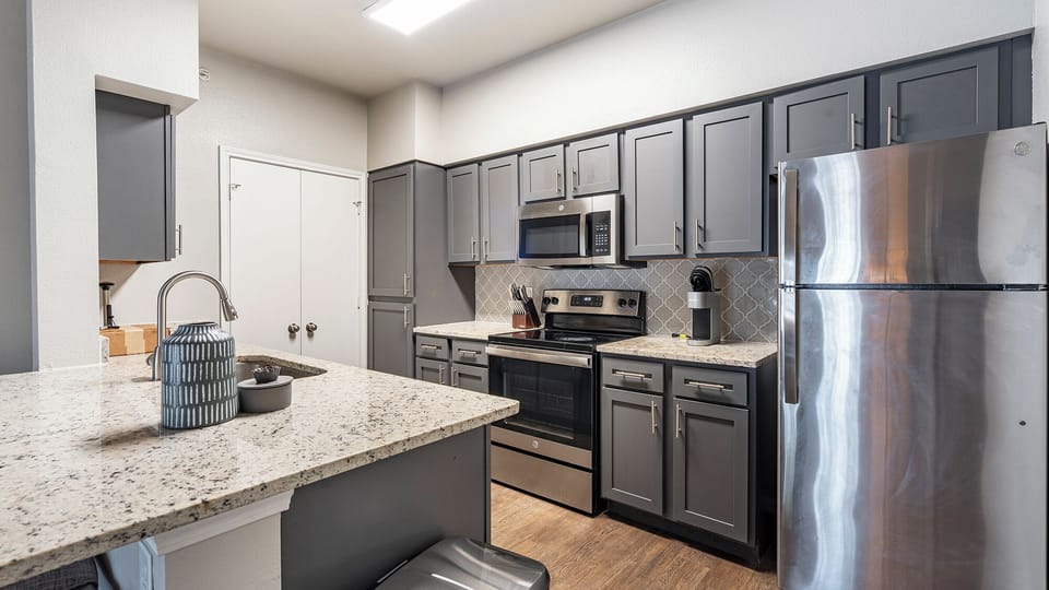 Apartment, 2 Bedrooms | Private kitchen | Full-size fridge, microwave, oven, stovetop