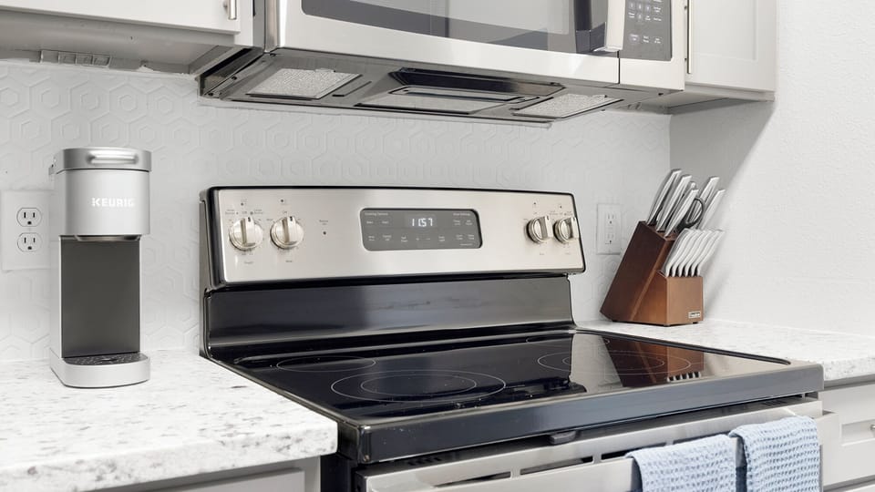 Apartment | Private kitchen | Full-size fridge, microwave, stovetop, dishwasher