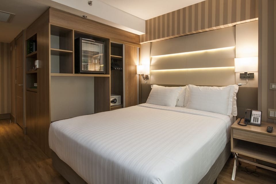 Double Room, Mobility Accessible | Minibar, in-room safe, individually furnished, desk