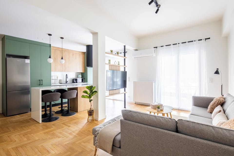Apartment, 2 Bedrooms, Kitchen, City View | Living room | 50-inch Smart TV with digital channels, streaming services
