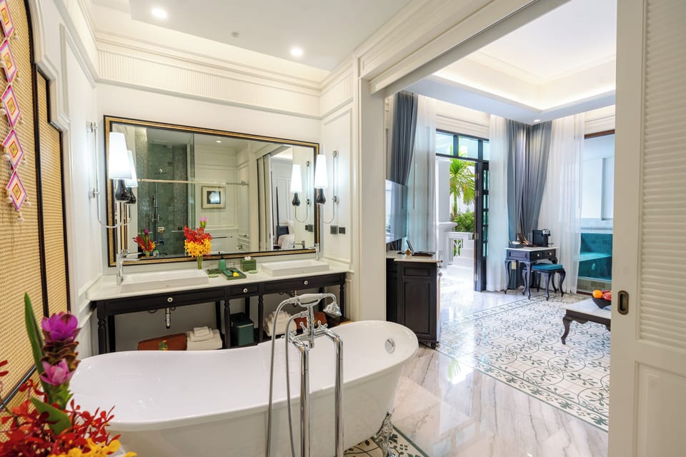 Crystal Pool Suite | Bathroom | Separate tub and shower, hair dryer, slippers, bidet