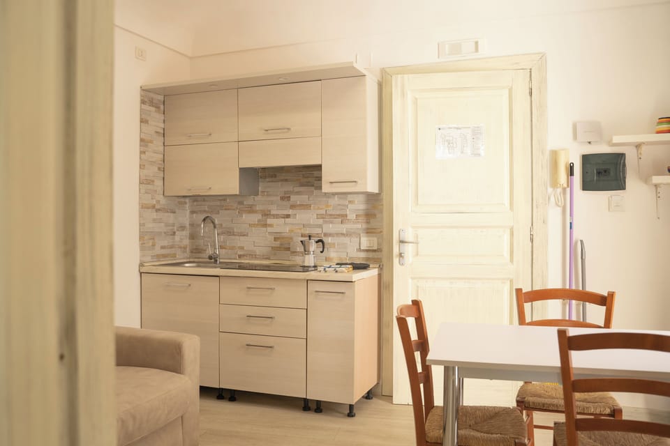 Superior Apartment | Private kitchen | Fridge, stovetop, espresso maker, cookware/dishes/utensils