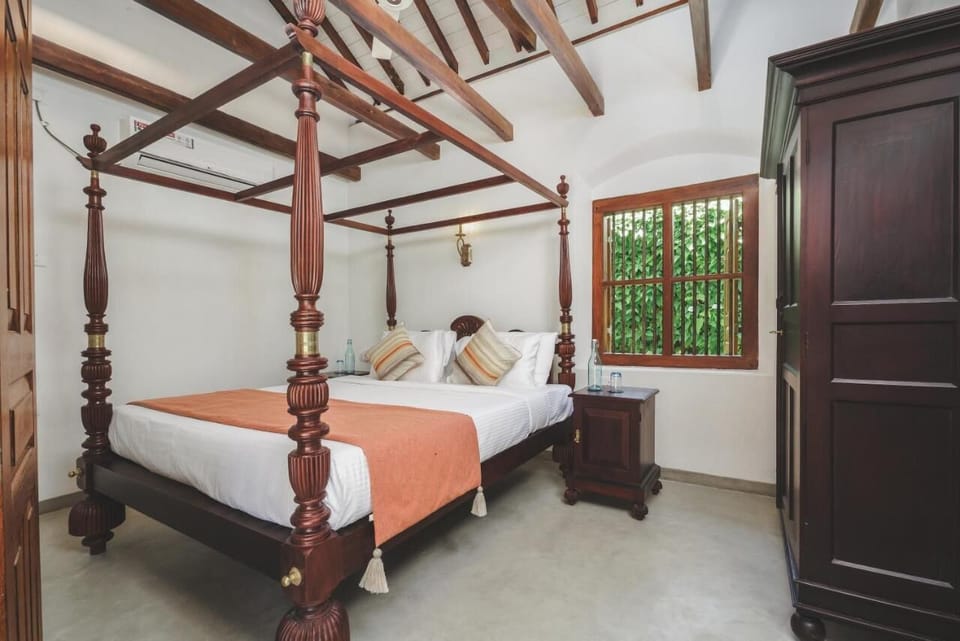 Luxury Suite, Garden View | In-room safe, iron/ironing board (on request), WiFi (free)