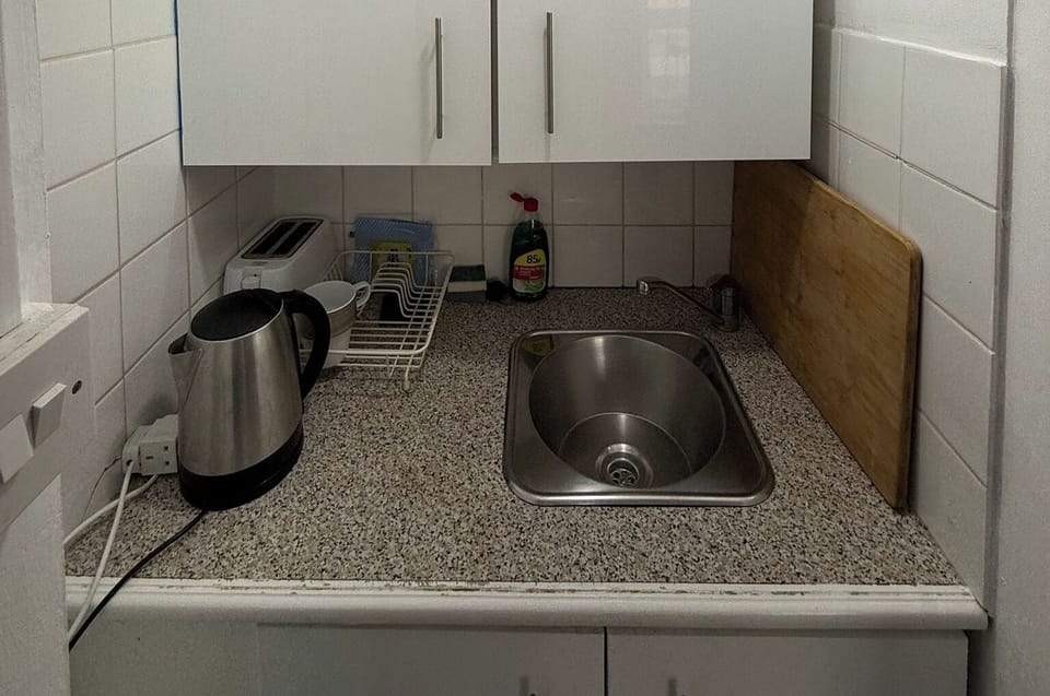 Fridge, microwave, electric kettle, toaster