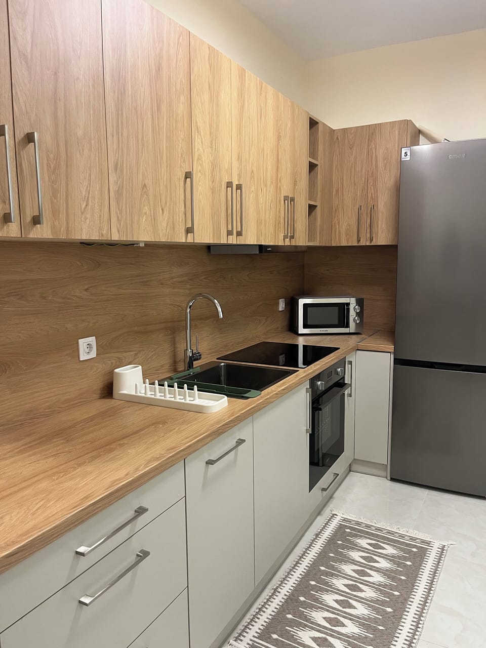 Apartment, Kitchen, Beach View | Private kitchen | Espresso maker, electric kettle, highchair
