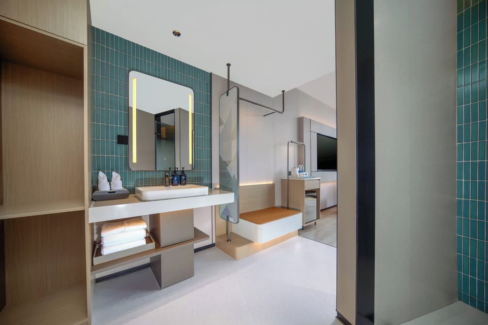1 King Standard City View | Premium bedding, down comforters, laptop workspace, blackout drapes