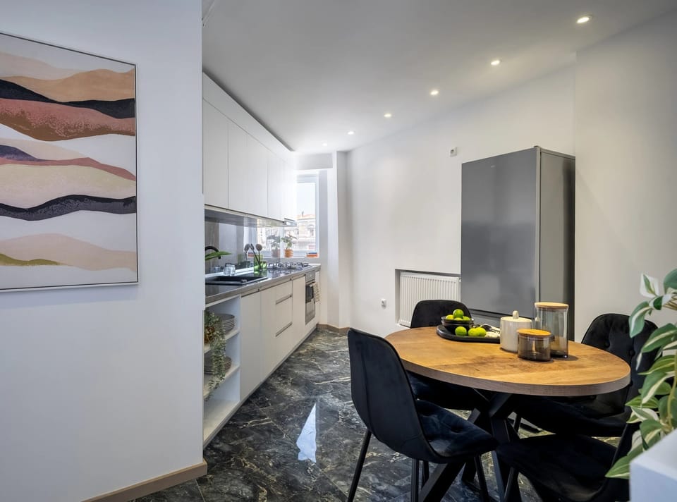 Deluxe Apartment, 3 Bedrooms, Balcony, City View | Private kitchen | Coffee/tea maker, electric kettle