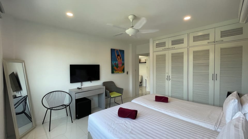Blackout drapes, iron/ironing board, WiFi (free), bed sheets