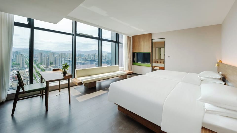 Family Twin Room, City View | Blackout drapes, soundproofing, iron/ironing board, free WiFi