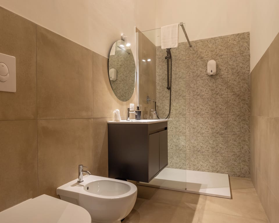 Superior Room | Bathroom | Hair dryer, bidet, towels, soap
