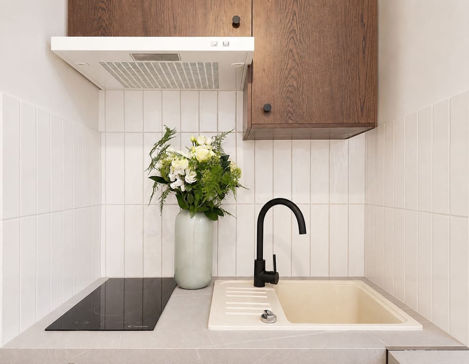 Superior Apartment, Courtyard View | Private kitchen | Espresso maker, electric kettle, toaster, freezer