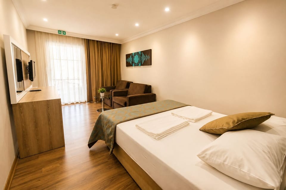 Family Studio Suite, Patio | Desk, laptop workspace, free WiFi