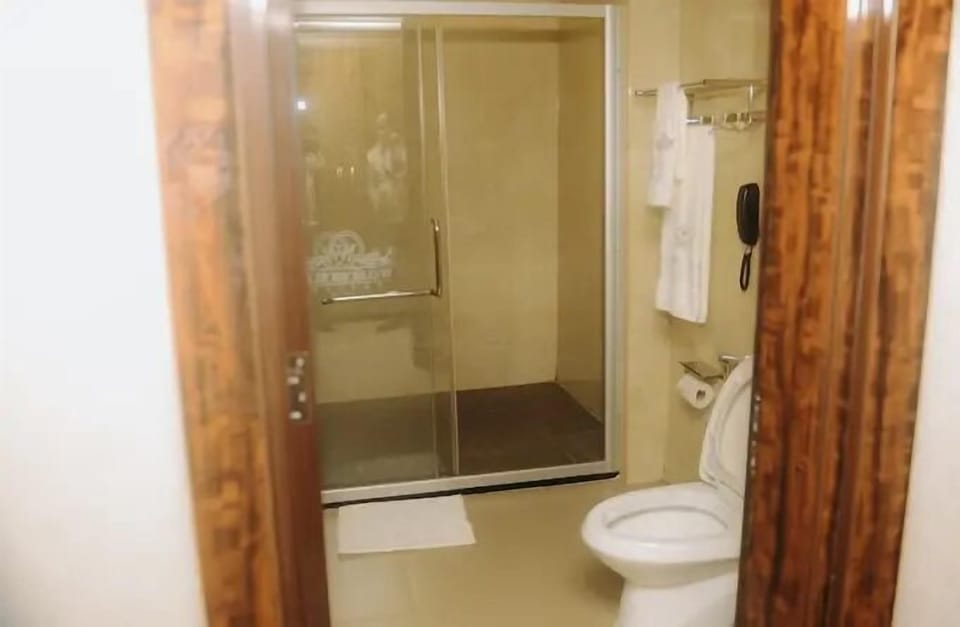 Economy Room, Balcony, City View | Bathroom | Free toiletries, hair dryer, towels, soap