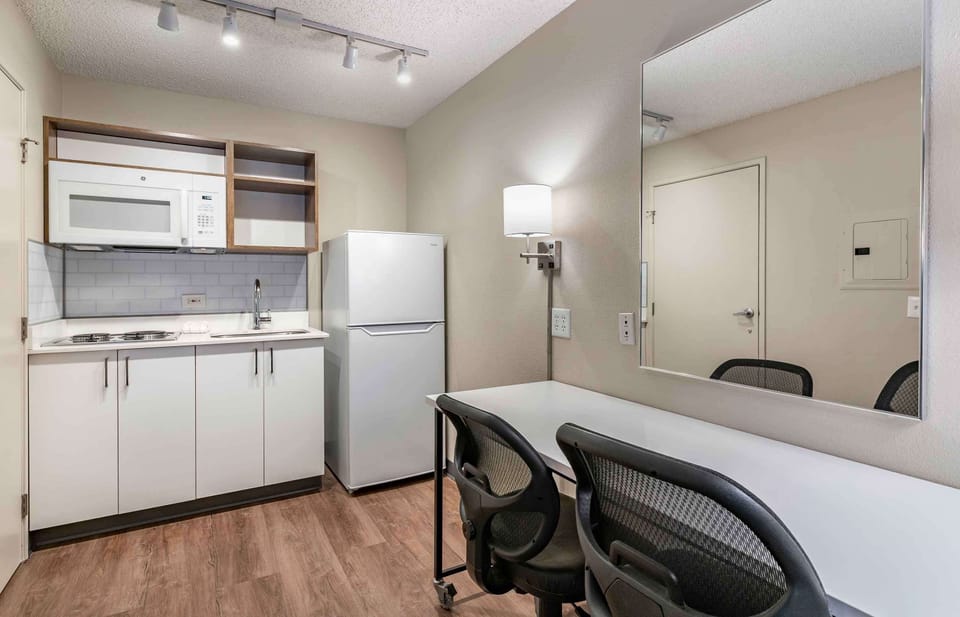 Studio, 1 Queen Bed, Non Smoking | Private kitchen | Fridge, microwave, stovetop, coffee/tea maker