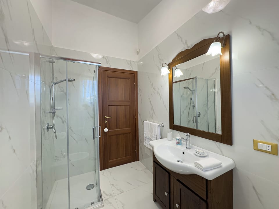 Double Room, Hill View | Bathroom | Shower, hair dryer, towels, soap