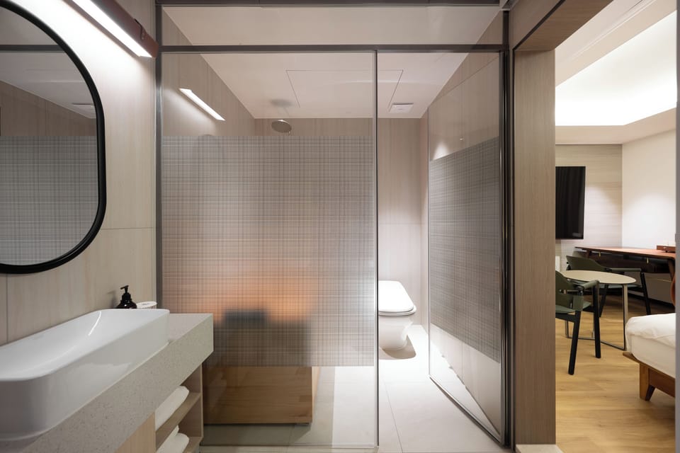 Premier Double Hinoki | Bathroom | Hair dryer, bidet, towels, toilet paper