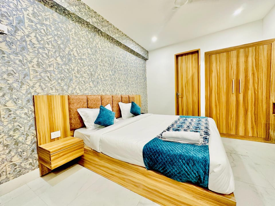 Luxury Double Room, Balcony, City View | In-room safe, desk, laptop workspace, iron/ironing board