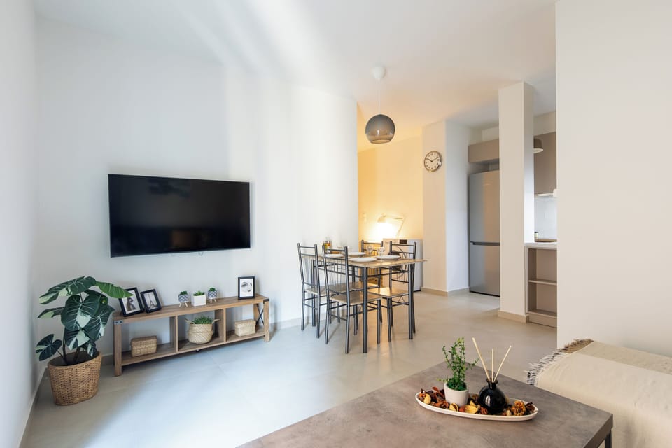 Apartment, 1 Bedroom, Kitchen, City View | Living room | 53-inch Smart TV with digital channels, streaming services