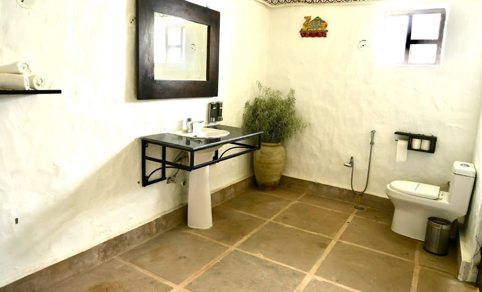 Tents With Sitout area | Bathroom | Shower, hair dryer, slippers, towels