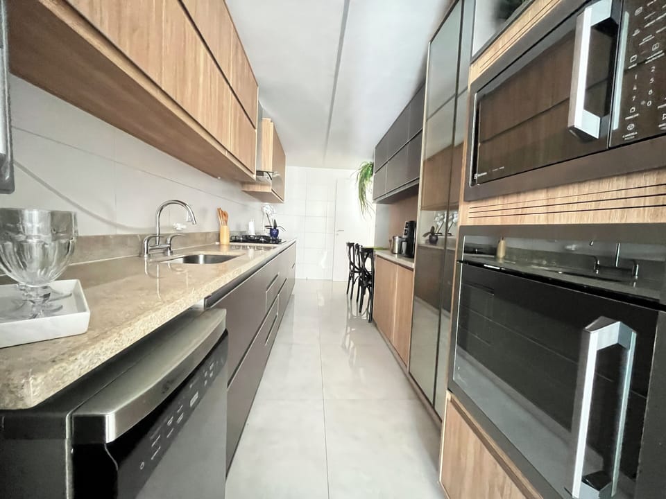Deluxe Apartment | Private kitchen | Full-size fridge, microwave, oven, espresso maker