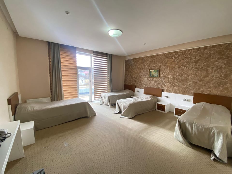 Standard Quadruple Room, Balcony | Free WiFi