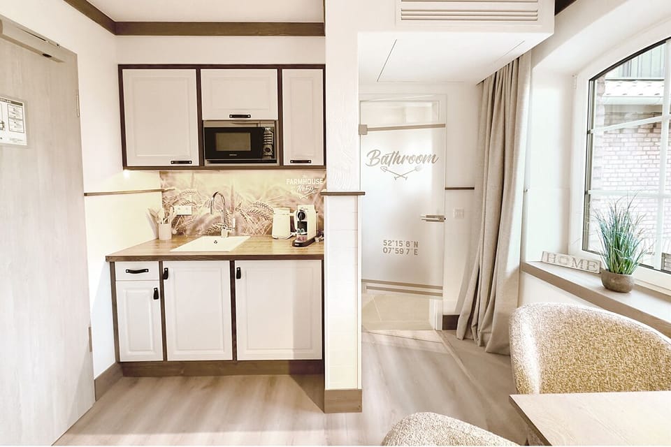 Family Studio, Kitchenette | Private kitchen | Shared microwave, highchair