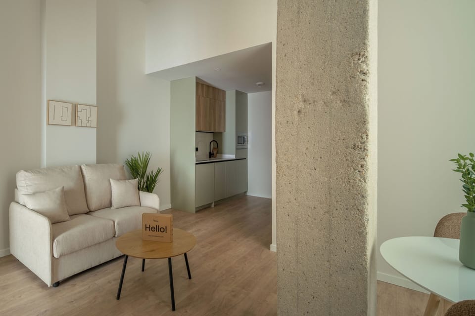 Apartment, 1 Bedroom | Living area | 50-inch TV with cable channels