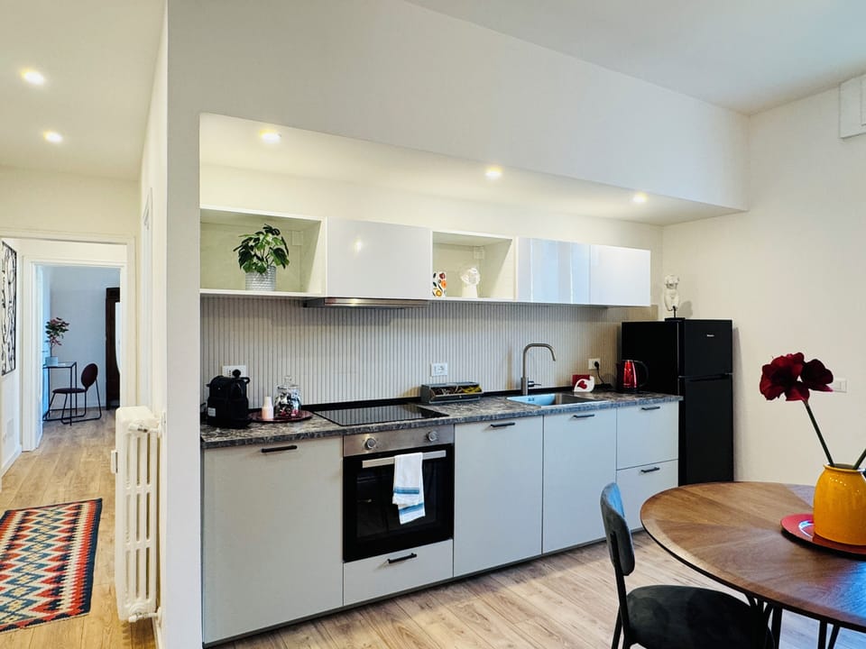 Design Apartment, 2 Bedrooms, Balcony, Courtyard View | Private kitchen | Fridge, oven, stovetop, dishwasher