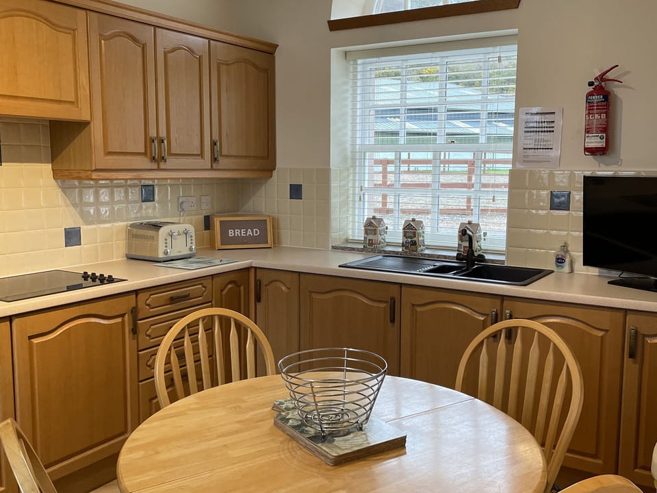 Fridge, microwave, toaster, cookware/dishes/utensils