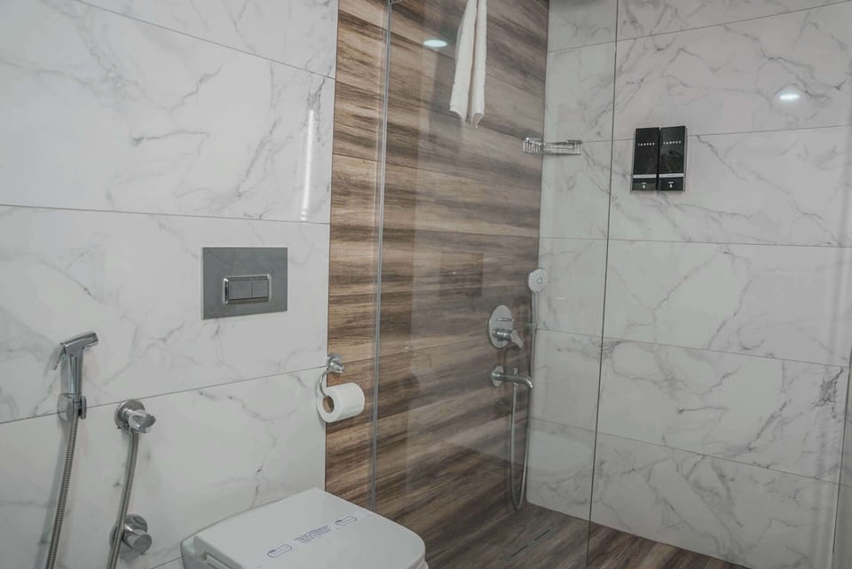 Premium Triple Room | Bathroom | Shower, rainfall showerhead, hair dryer, slippers