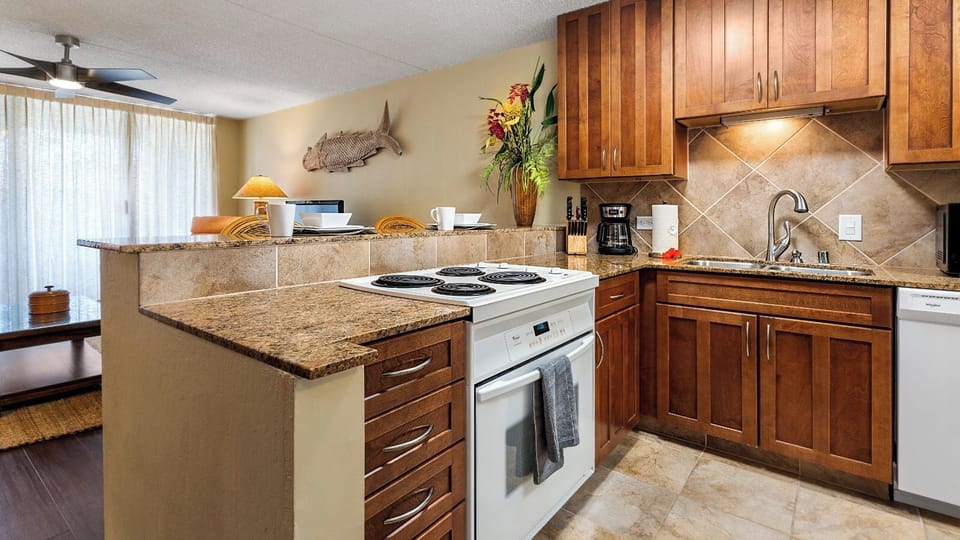 Condo, 1 King Bed, Lanai, Partial Ocean View (Kona Pacific C520.) | Private kitchen | Dining tables