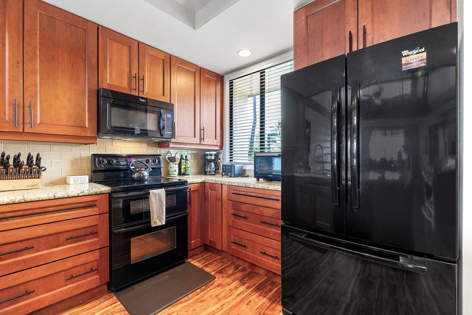 Condo, Multiple Beds, Balcony, Ocean View (Country Club Villas 315) | Private kitchen | Dining table