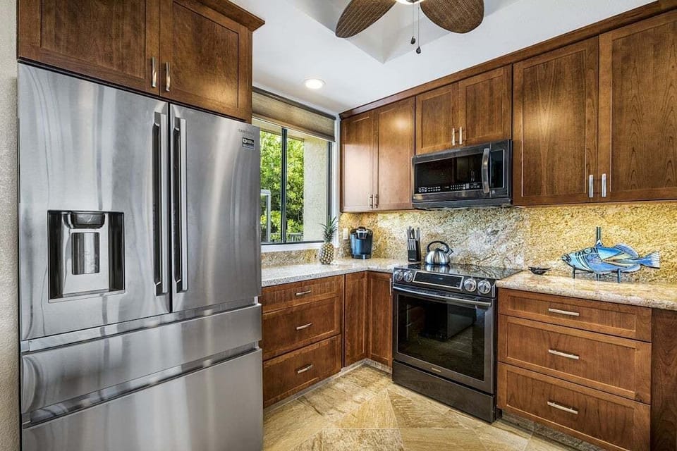 Condo, Multiple Beds, Balcony, Ocean View (Country Club Villas 318) | Private kitchen | Coffee/tea maker, dining table