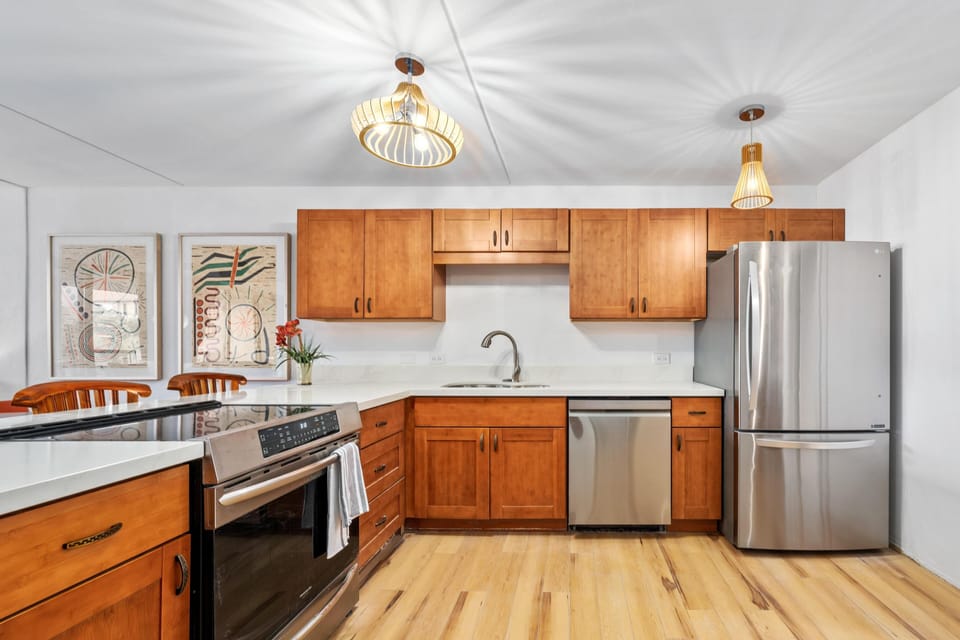 Condo, Multiple Beds, Lanai, Partial Ocean View (Kona Pacific A306) | Private kitchen | Dining tables