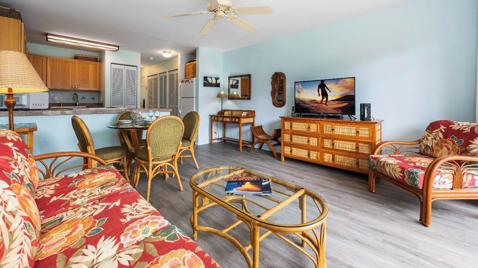 Condo, 1 Queen Bed with Sofa bed, Lanai, Partial Ocean View (Kona Isle B22) | Living area | 42-inch flat-screen TV with digital channels
