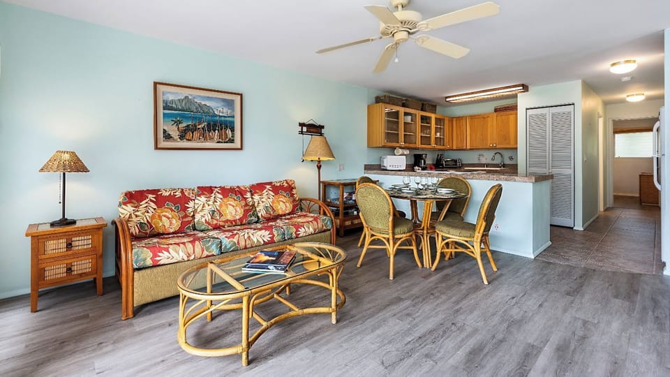 Condo, 1 Queen Bed with Sofa bed, Lanai, Partial Ocean View (Kona Isle B22) | Living area | 42-inch flat-screen TV with digital channels