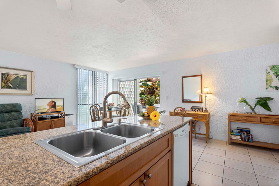 Condo, 1 King Bed with Sofa bed, Lanai, Garden View (Alii Villas 107) | Private kitchen | Coffee/tea maker, dining tables