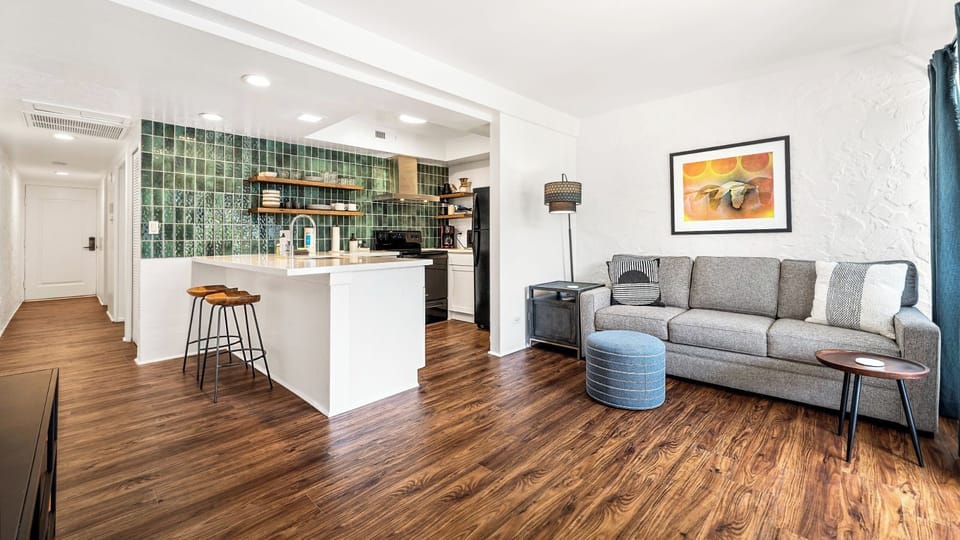 Condo, 1 King Bed, Lanai, Garden View (Casa de Emdeko 124) | Living area | 55-inch flat-screen TV with digital channels