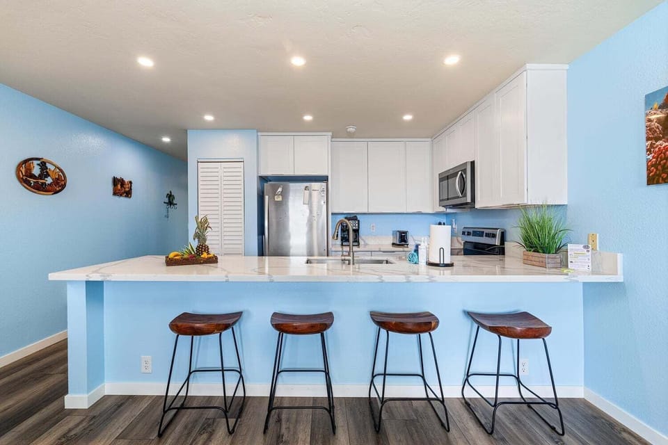 Condo, Multiple Beds, Lanai, Ocean View (Sea Village 2106) | Private kitchen | Dining tables