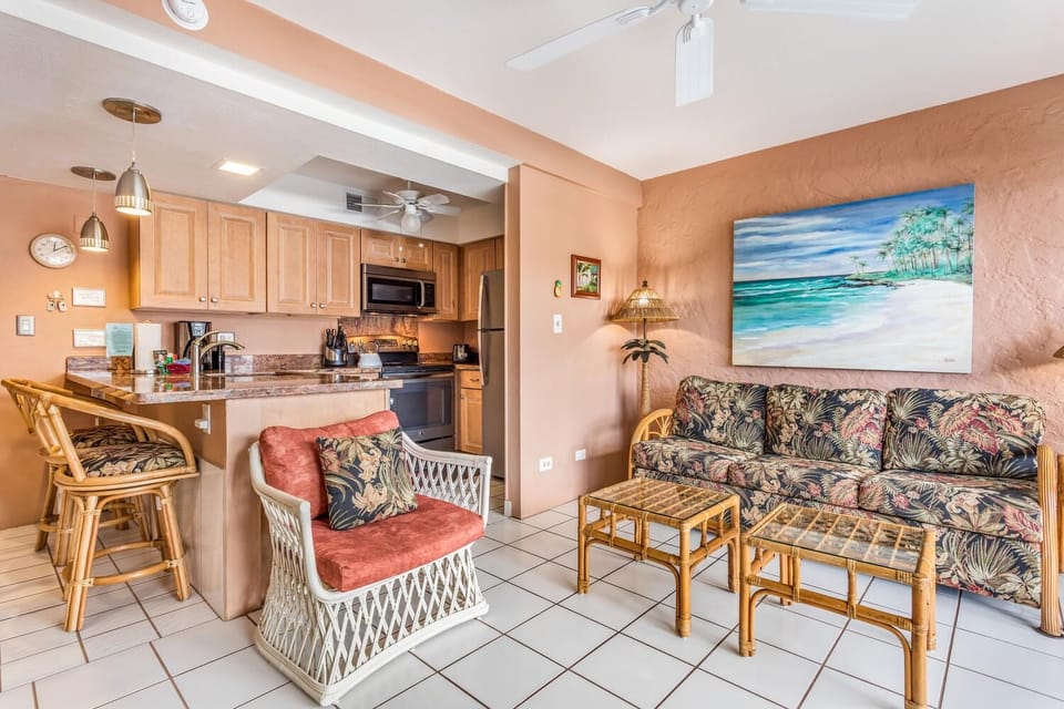 Condo, 1 King Bed, Lanai, Partial Ocean View (Casa de Emdeko 232) | Living area | 42-inch flat-screen TV with digital channels