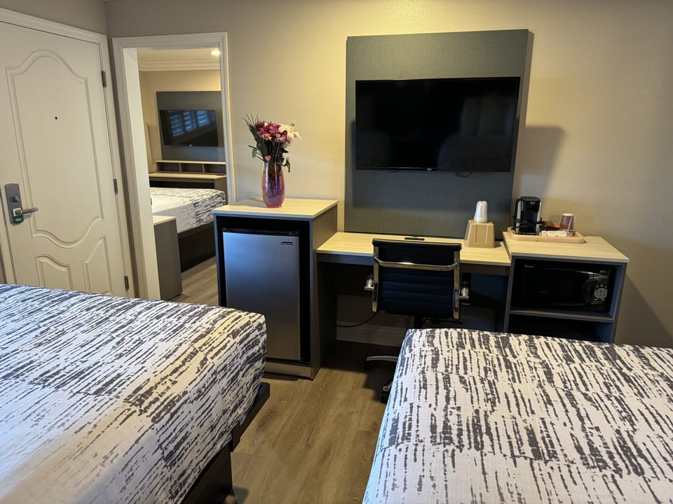 Suite, 2 Bedrooms (2 Double Beds, 1 Queen Bed) | Desk, iron/ironing board, free WiFi, bed sheets