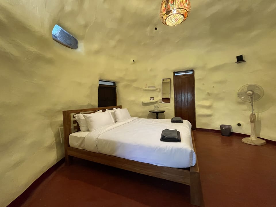 Round House ( Cave Room ) | Down comforters, memory foam beds, individually decorated, free WiFi